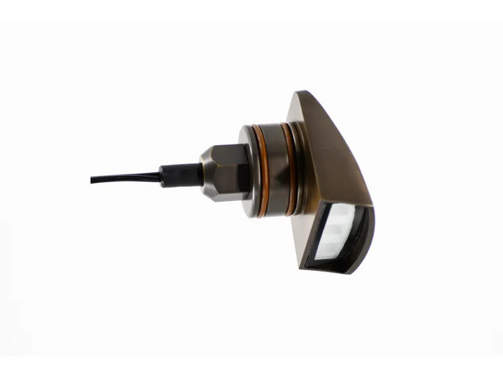 Side view of the Lumien Lighting 3000K fully integrated brass fixture, featuring an antique finish and compact design for outdoor lighting.