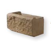 Tan corner split faced retaining wall block.