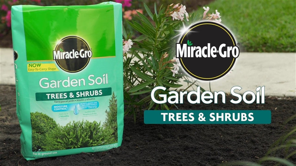 Miracle-Gro Garden Soil for Trees & Shrubs displayed outdoors, highlighting its Moisture Control technology and benefits for healthy tree and shrub growth.